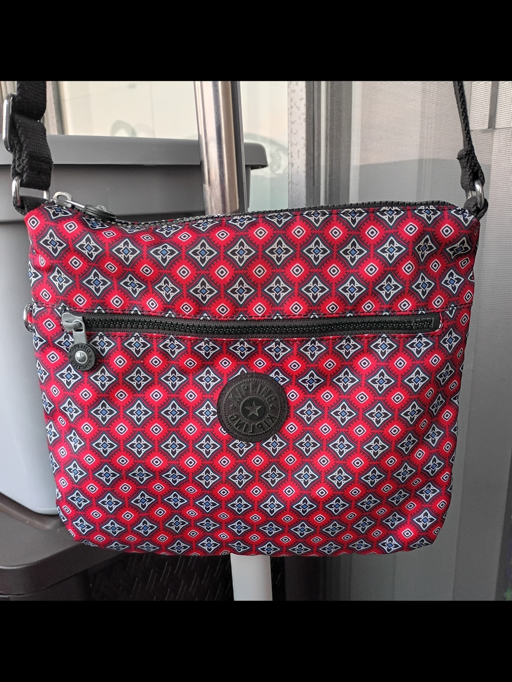 Kipling Jaime crossbody shoulder bag in the red mystical medallion